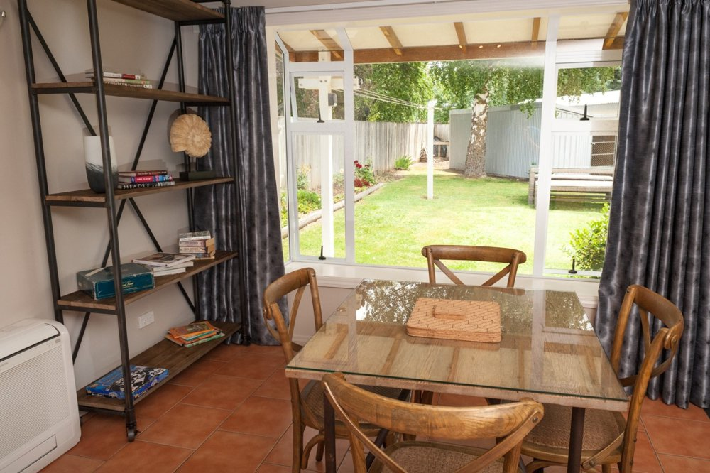 Dining area with view of back lawn